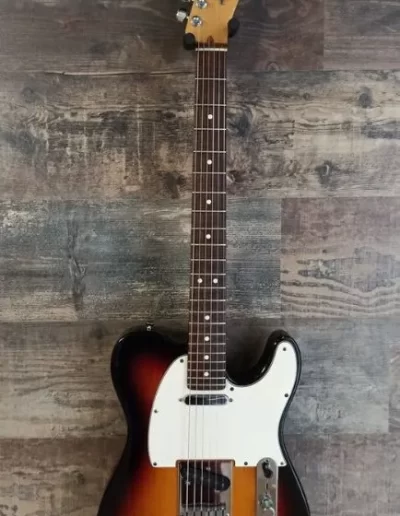 Exposición en pared de guitarra Fender Tele 1952 Sunburst